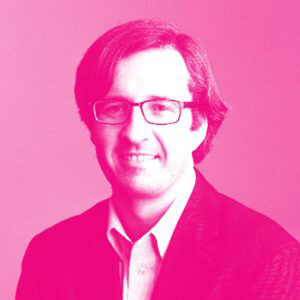 Alexander Whalley's headshot with a hot pink filter.