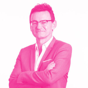 Andrew Dzurak's headshot with a hot pink filter.