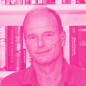 Andrew Thompson's headshot with a hot pink filter.