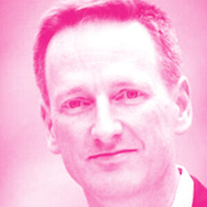 Dave Bennett's headshot with a hot pink filter.