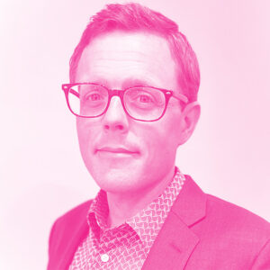 David Broemeling's headshot with a hot pink filter.