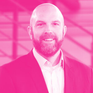 Don Duval's headshot with a hot pink filter.