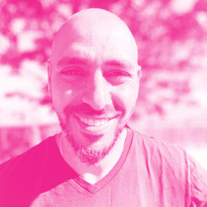 Eddie Gobran's headshot with a hot pink filter.