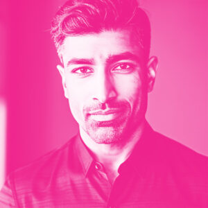 Gautam Goel's headshot with a hot pink filter.