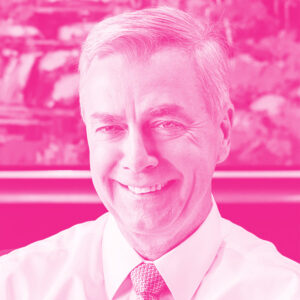 JJ Ruest's headshot with a hot pink filter.