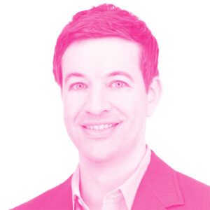 Kurt Roots' headshot with a hot pink filter.