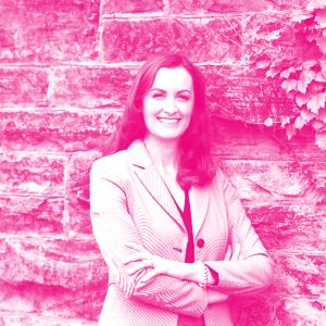 Laura Rosella's headshot with a hot pink filter.