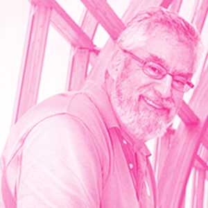 Michael Sefton's headshot with a hot pink filter.