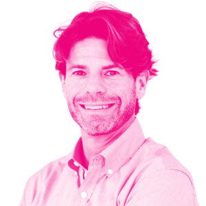 Michael Stucky's headshot with a hot pink filter.