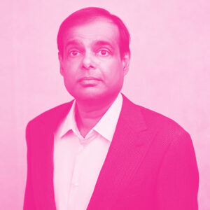 Niranjan Mayya's headshot with a hot pink filter.