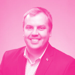 Siim Sikkut's headshot with a hot pink filter.