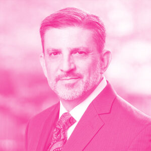 Todd Neville's headshot with a hot pink filter.