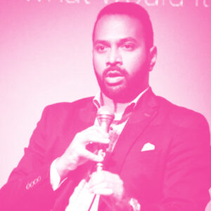 Vik Kambli's headshot with a hot pink filter.