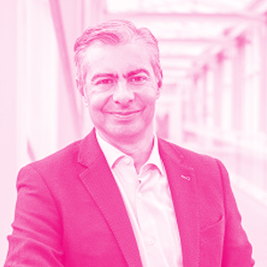 Abel Archundia's headshot with a hot pink filter.