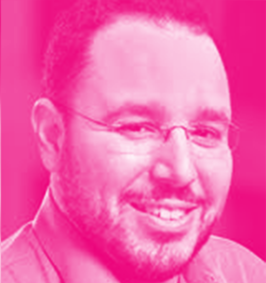 Joshua Gans' headshot with a hot pink filter.