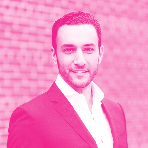 Michael Bucella's headshot with a hot pink filter.
